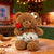24. Teddy Bear Wearing a Shirt Holding Flowers