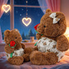 24. Teddy Bear Wearing a Shirt Holding Flowers