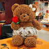 24. Teddy Bear Wearing a Shirt Holding Flowers