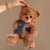 9. Brown Bear Hugging a Denim Bear