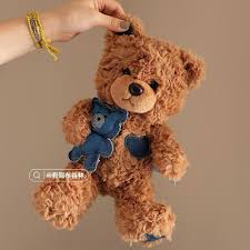 9. Brown Bear Hugging a Denim Bear