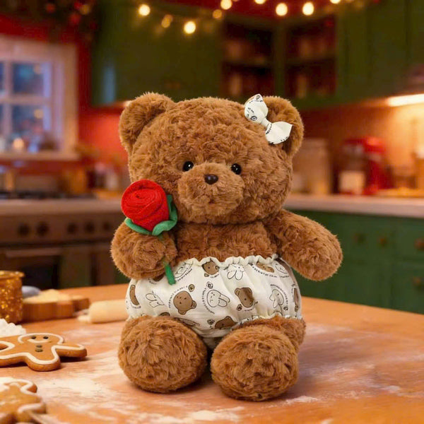 24. Teddy Bear Wearing a Shirt Holding Flowers